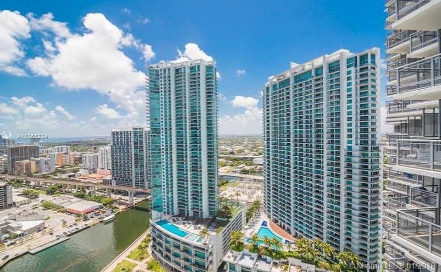 WIND BY NEO! LIGHT FILLED 1 BEDROOM/1 BATH PLUS. DIRECT VIEW TO MIAMI RIVER. LUXURY FINISHED INCLUDE EUROPEAN NOLTE KITCHENS, STAINLESS STEEL APPLIANCES, GRANITE COUNTER TOPS. LOCATED IN "RIVERFRONT" DOWNTOWN'S ONLY PRIVATE GATED COMMUNITY ON THE MAIN RIVER. 5 START AMENITIES INCLUDE: HEATED POOL, WATERFALL JACUZZI, STATE-OF-ART 2 STORY FITNESS CENTER, HIS & HER SPA, SAUNA ROOM, STEAM ROOM, INDOOR RACQUETBALL COURT, SPORTS PARLOR, MEDITATION ROOM, PRIVATE THEATER, 24HR CONCIERGE & MUCH MORE.