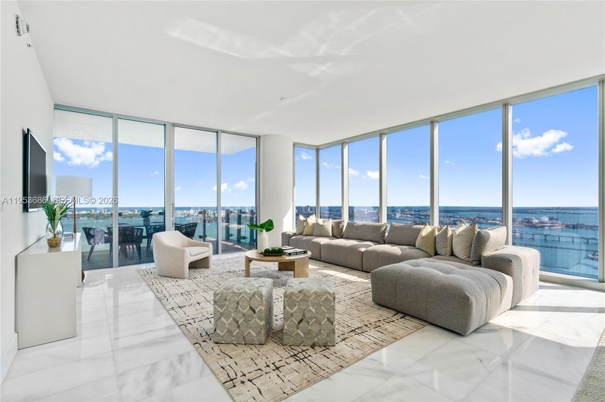 This spectacular residence offers the epitome of modern living with 4 spacious bedrooms, a family room, and 6 elegant baths, all adorned with impeccable finishes. Revel in unobstructed water views and a breathtaking city skyline from your floor-to-ceiling windows. Convenience is key, with a separate laundry room and extra storage ensuring ample space for all your needs. Don't miss the chance to call this stunning property home – where impeccable design meets unparalleled vistas at Missoni Baia.
Parking spaces unit is 522 & 523.