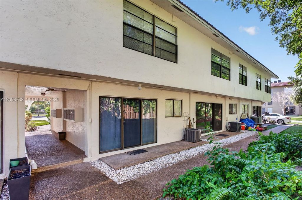 Photo of 2526 Coral Springs Dr #2526, Coral Springs, FL 33065 (MLS # A12008732)