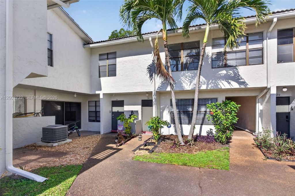 Photo of 2526 Coral Springs Dr #2526, Coral Springs, FL 33065 (MLS # A12008732)