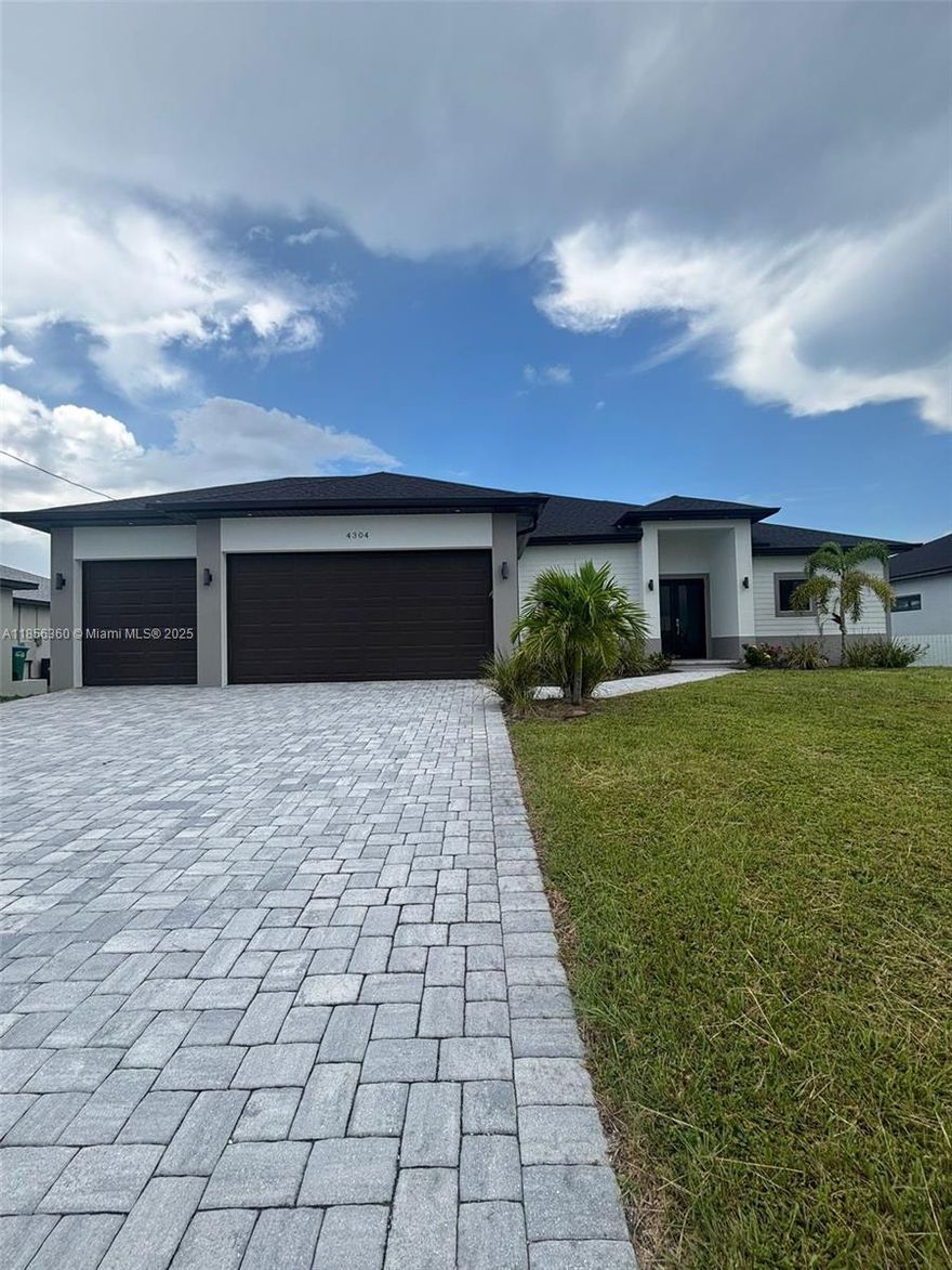 Your Cape Coral dream starts here!
Steps from the future Seven Islands Project, this brand-new home offers spacious, high-end modern living—room for a sparkling pool, your own BBQ paradise, and high-impact doors for safety and style.
The lifestyle you’ve been waiting for is ready—are you?"