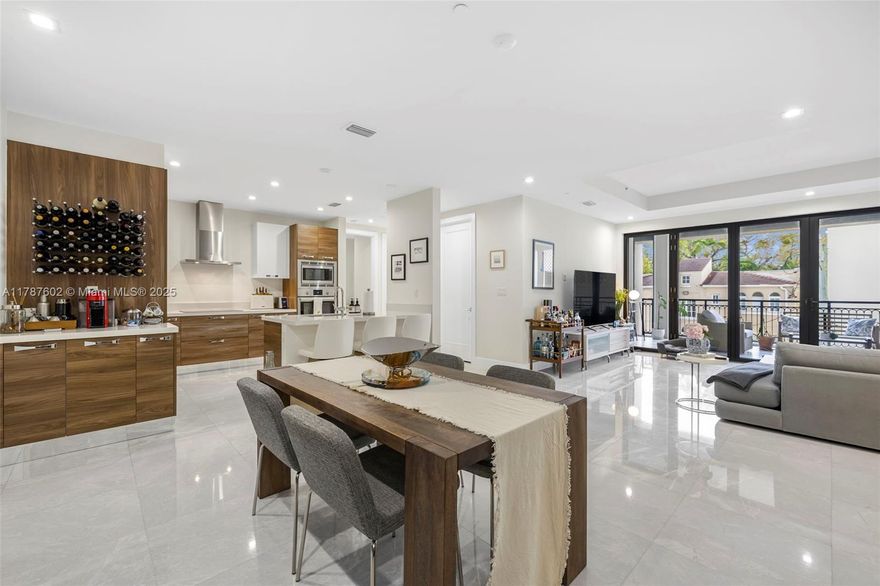 Experience elevated living at Biltmore Parc, Coral Gables’ premier boutique residence. This sophisticated 2BD, 2.5BA PLUS DEN home features private elevator access, an airy open layout, marble flooring throughout, and 2 assigned parking spaces. The European kitchen is outfitted with sleek Bosch appliances, while a spacious laundry room adds ease and elegance. NanaWall doors reveal a sprawling terrace with lush views, a built-in screen enclosure, and new electronically controlled mosquito nets. Built in 2017, this 32-residence building offers 24-hr concierge, and key fob entry. Prime location near fine dining, shopping, parks, and golf.