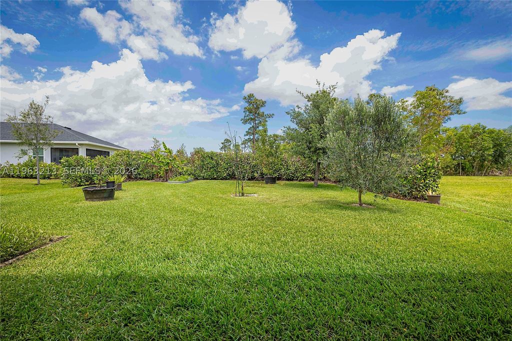Photo of 797 SE Bloomfield Rd, Port St Lucie, FL 34984 (MLS # A11963213)