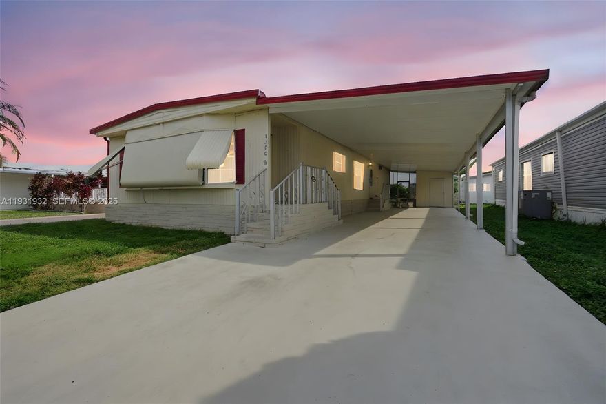 WELCOME TO THIS WELL-MAINTAINED AND LARGE 2 BEDROOM, 2 BATHROOM HOME LOCATED IN THE DESIRABLE RAVENSWOOD ESTATES. THE HOME OFFERS A SPACIOUS LAYOUT WITH CERAMIC TILE FLOORING THROUGHOUT AND AN ABUNDANCE OF NATURAL LIGHT. AN EXTRA-LARGE CARPORT PROVIDES PARKING FOR UP TO FOUR VEHICLES AND INCLUDES A CONVENIENT STORAGE SHED. THE ENCLOSED PORCH FEATURES A SEPARATE ENTRANCE AND SINK/WET BAR, OFFERING FLEXIBLE SPACE THAT CAN EASILY BE CONVERTED INTO A THIRD BEDROOM, HOME OFFICE, OR GUEST AREA. ENJOY A PRIVATE BACKYARD WITH MATURE HEDGES, PERFECT FOR RELAXING OR ENTERTAINING. UPDATES INCLUDE NEWER APPLIANCES (APPROXIMATELY 4 YEARS OLD) AND A WATER HEATER REPLACED ABOUT 3 YEARS AGO. LOW ASSOCIATION FEE OF JUST $70 PER MONTH, AND YOU OWN THE LAND. COMMUNITY AMENITIES INCLUDE A CLUBHOUSE AND A LARGE, WELL-MAINTAINED POOL. IDEALLY LOCATED APPROXIMATELY 10 MINUTES FROM DANIA AND HOLLYWOOD BEACHES, SHOPPING, DINING, AND THE GUITAR HOTEL. MOTIVATED SELLER — EASY TO SHOW, SCHEDULE YOUR SHOWING TODAY.