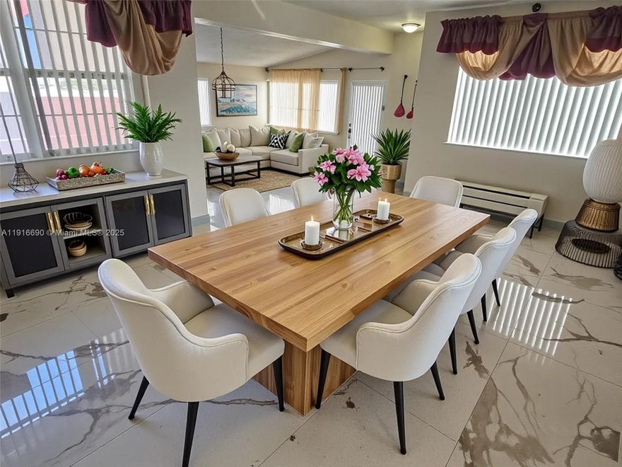 Beautiful 3/2 Home with New Modern Tiles, New Updated Kitchen with Appliances. large Backyard facing lake with Mango Tree. Circular Driveway to accommodate at least 6 Cars. Call listing agent to see it today!!954-612-3767