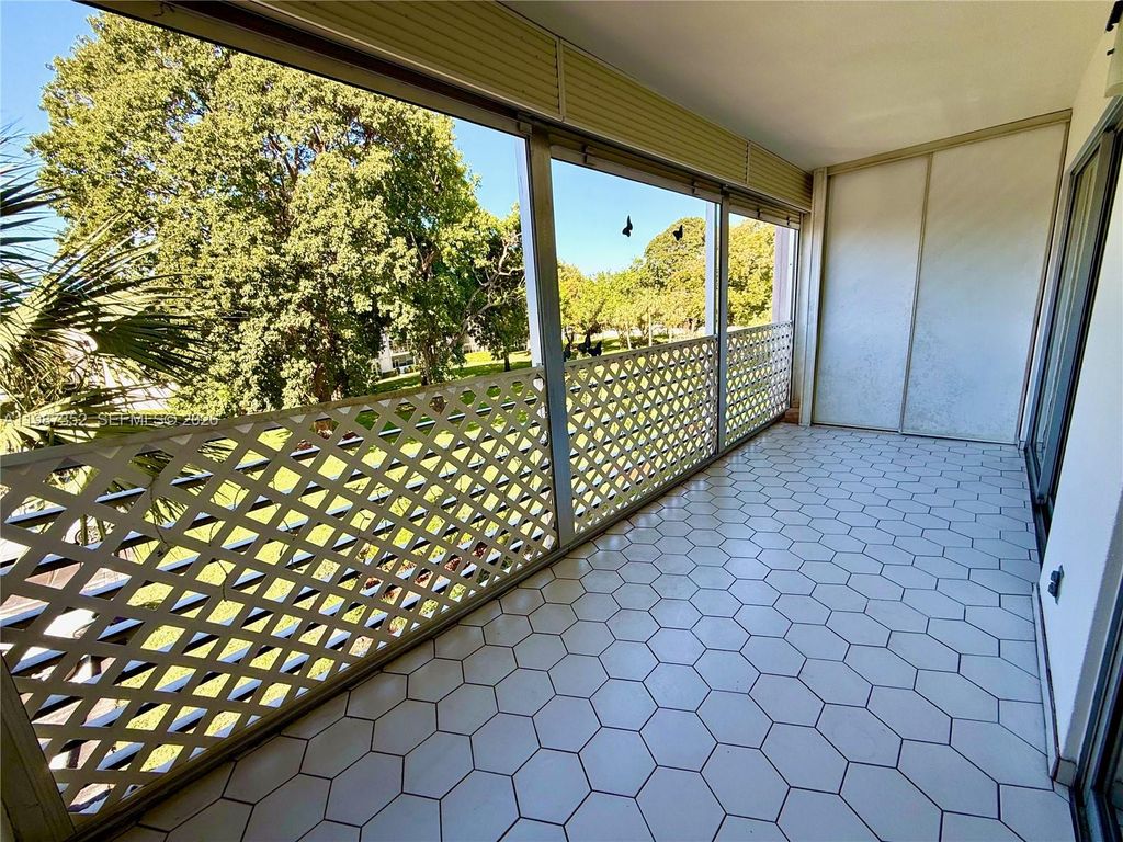 Photo of 2001 Granada Dr #A3, Coconut Creek, FL 33066 (MLS # A11987352)