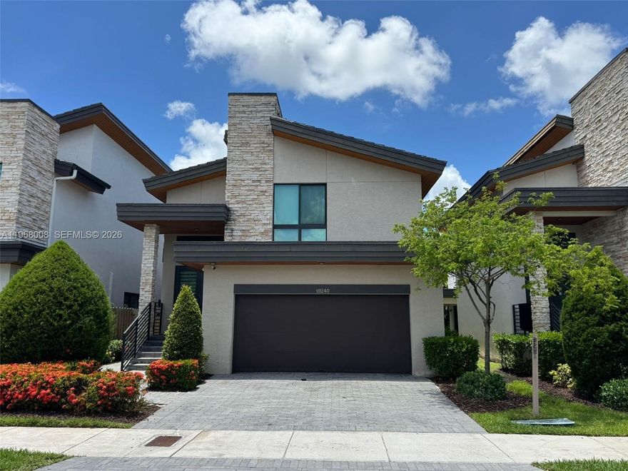 Stunning 3BR/3.5BA home in gated Pineapple at Pinnacle Park Central, Doral. Features open layout, modern finishes, and a gourmet kitchen with premium appliances and island. Spacious bedrooms with ample closets. Luxurious baths offer double vanities and glass showers. Large private patio. Enjoy resort-style amenities: clubhouse, pools, tennis courts, gym, and elegant social spaces. Prime location near Publix, dining, shops, major highways, and A-rated schools. Style, comfort, and convenience in one perfect address! Gated community with 24/7 security, beautifully landscaped surroundings, and family-friendly atmosphere. Perfect for those seeking luxury and lifestyle in the heart of Doral.