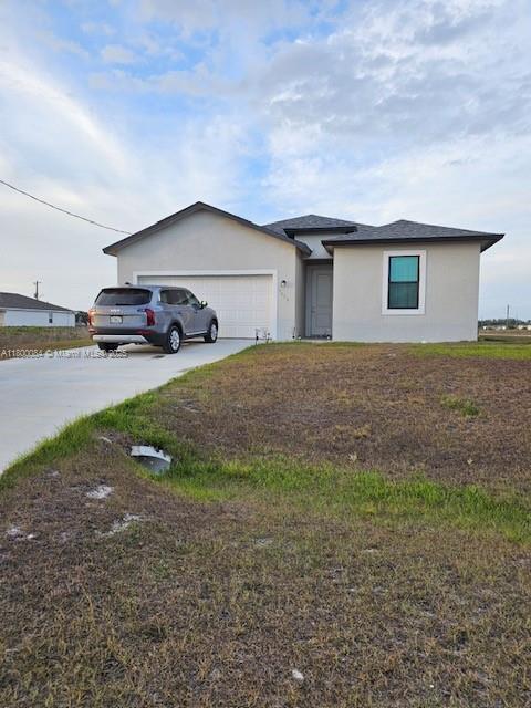Discover this beautiful corner home with an excellent layout and natural light in every room. It features 4 spacious bedrooms, 3 full bathrooms, a cozy living room, a separate dining area, and a modern kitchen with updated cabinets. Enjoy the convenience of a 2-car garage and an in-unit washer and dryer.
