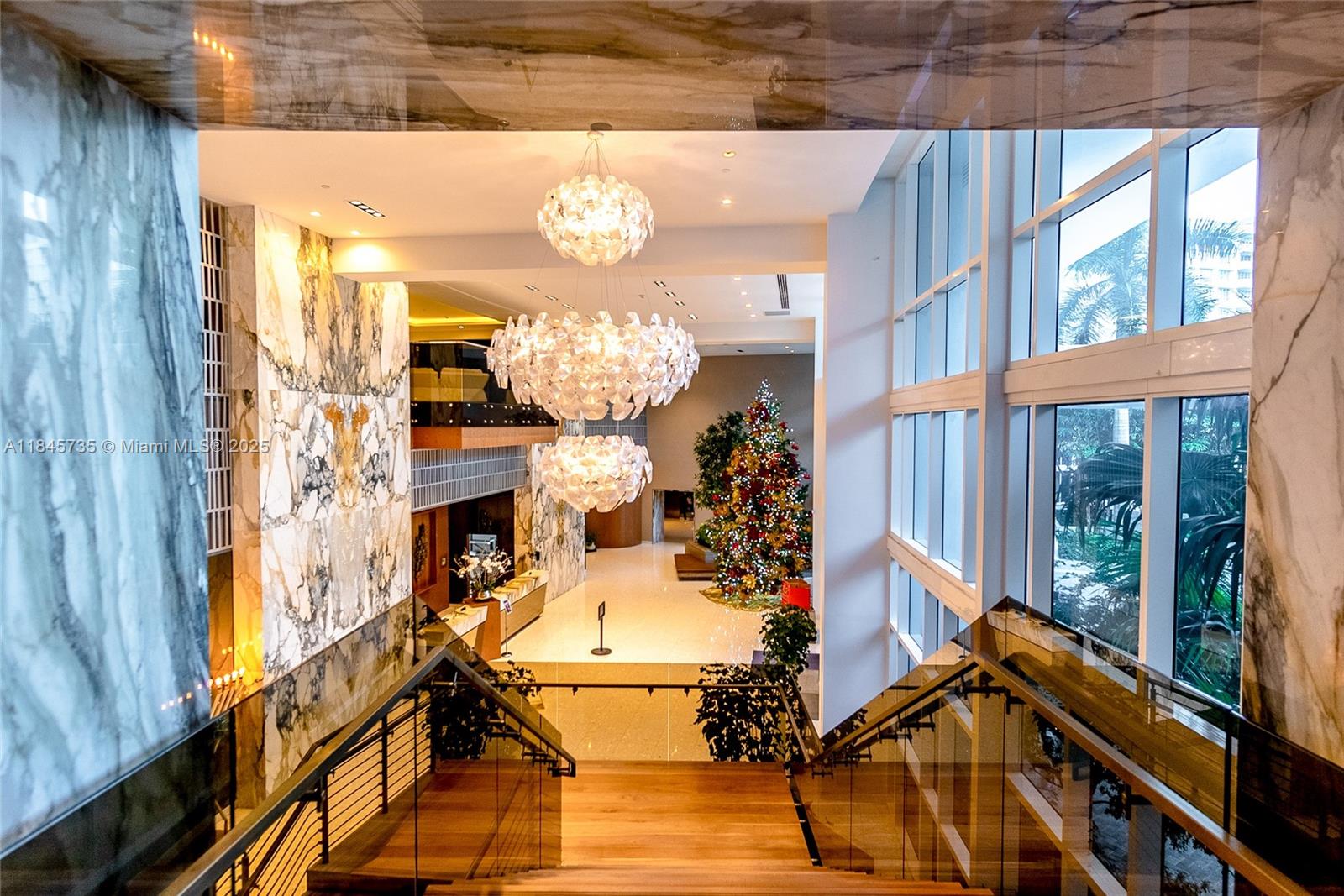 Ultra-luxurious fully-furnished 2BD/2BA at prestigious Paramount Bay. Residence includes private elevator, 10' ceilings, marble flooring, luxury crystal lighting, floor-to-ceiling windows/sliders w/ custom automatic shades, and more. The kitchen is fully-equipped w/ Italian cabinetry and high-end appliances, including Wolf, Sub-Zero, Nespresso, and more. The primary suite features a custom 3-D wall, private water closet w/ bidet, walk-in closet, and custom shower w/ one-of-a-kind switchable privacy glass (clear to frosted w/ the click of a button). In-unit laundry, Wi-Fi, Netflix, Hulu, Disney+, and water included. Luxury amenities include 24/7 valet, 2 pools, fitness center, spa, business lounge, and more. If desired, second bedroom can be converted to home office w/ annual lease.