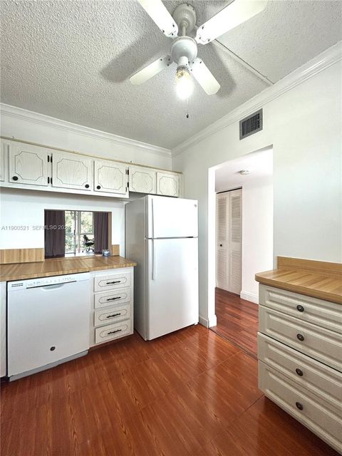 Photo of 6005 Del Lago Cir #210, Sunrise, FL 33313 (MLS # A11900521)