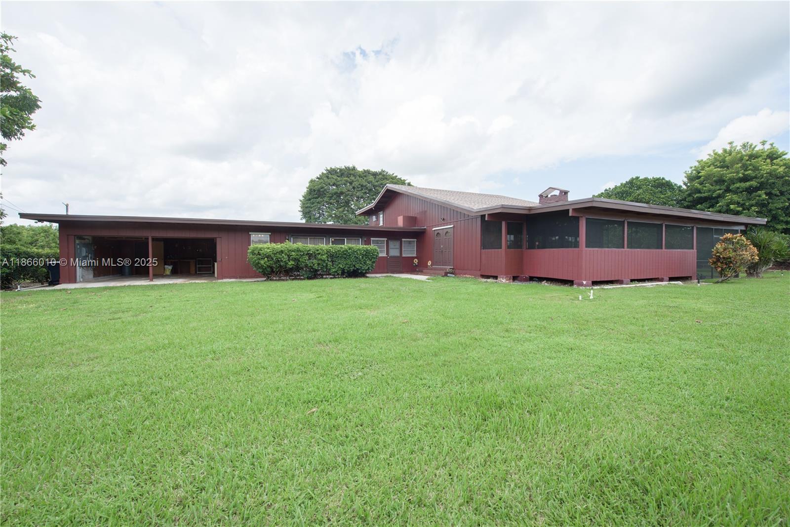 Stunning 4BR/4BA home on 3.75 acres in the Redlands! Includes 2-story attached In-Law Quarters w/ private entrance. Features tongue & groove ceilings, tile, wood & vinyl floors, fan/lights throughout, impact panels, & generator hookup. Gourmet kitchen w/ cooktop, oven, dishwasher, fridge, pantry. Multiple living areas, decorative fireplace, French doors, & bug-screened patio. Upstairs suite w/ Roman tub, dual sinks, 2 closets. In-law quarters w/ kitchen, walk-in closet, full bath, & new A/C. Barn fits 3 cars-2 open, 1 enclosed. 2-car garage, 2 meters, water softener, well pump, sprinklers, fruit trees. PROOF OF FUNDS AND/OR PRE-APPROVAL LETTER REQUIRED PRIOR TO SCHEDULING A SHOWING OF THE PROPERTY!!