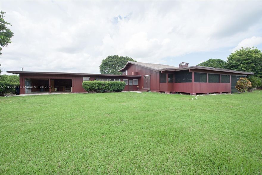 Stunning 4BR/4BA home on 3.75 acres in the Redlands! Includes 2-story attached In-Law Quarters w/ private entrance. Features tongue & groove ceilings, tile, wood & vinyl floors, fan/lights throughout, impact panels, & generator hookup. Gourmet kitchen w/ cooktop, oven, dishwasher, fridge, pantry. Multiple living areas, decorative fireplace, French doors, & bug-screened patio. Upstairs suite w/ Roman tub, dual sinks, 2 closets. In-law quarters w/ kitchen, walk-in closet, full bath, & new A/C. Barn fits 3 cars-2 open, 1 enclosed. 2-car garage, 2 meters, water softener, well pump, sprinklers, fruit trees.  PROOF OF FUNDS AND/OR PRE-APPROVAL LETTER REQUIRED PRIOR TO SCHEDULING A SHOWING OF THE PROPERTY!!
