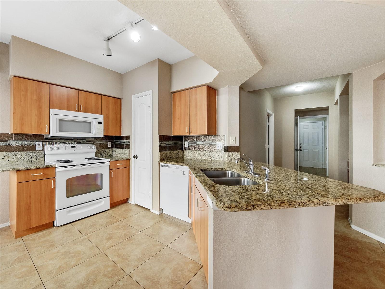 Bright, spacious, and beautiful 3/2 1636 sqft unit, with 2 car space garage, first floor, corner unit with walking closet, granite counter tops in kitchen and baths, laminate and tile floors, laundry room, and small porch. Property is located in a great and secure area of Boyton Beach, at the well keep Gated community of Belmont Residences of Boyton Beach, which features pool, hot spa, club house, fitness room, and more. Property currently occupied and will be professionally clean.Water, sewer, and garbage included in the rent. Make your appointment soon.