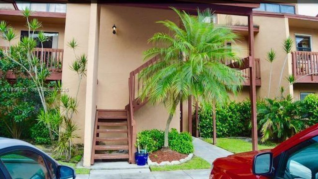 Photo of 604 E Lakeview Dr E #604, Royal Palm Beach, FL 33411 (MLS # A11999515)