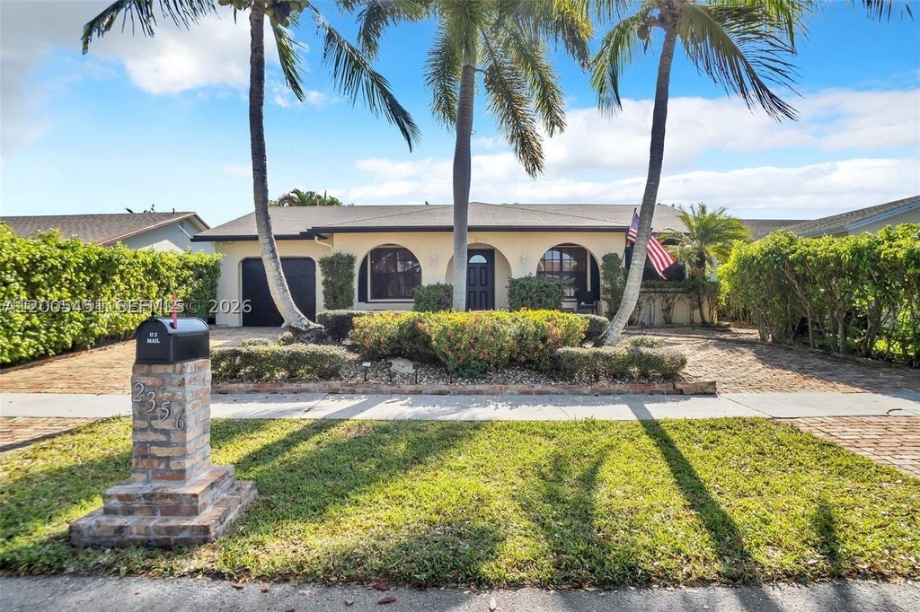Photo of 2356 NW 111th Ave, Sunrise, FL 33322 (MLS # A12005451)