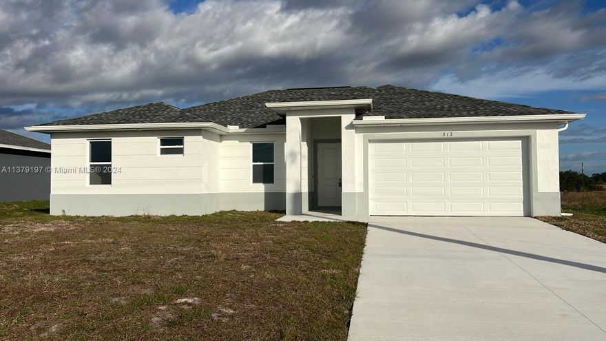 New construction: IN BANYAN VILLAGE beautiful and SPACIOUS 3 BEDROOMS 2 BATHROOMS. This home was designed modernly with a lot of features: Tray ceilings, lanai under truss, impact resistant windows and doors, all tile floors, floor to ceiling tiled master shower, 8’ interior doors, 9'4" ceiling high, Stainless steel appliances, Automatic garage door opener, ceiling fans in bedrooms and great room, irrigation system, gutters at the front,  a nice size laundry room with a sink near the garage. 10 YEAR HOME WARRANTY!!!