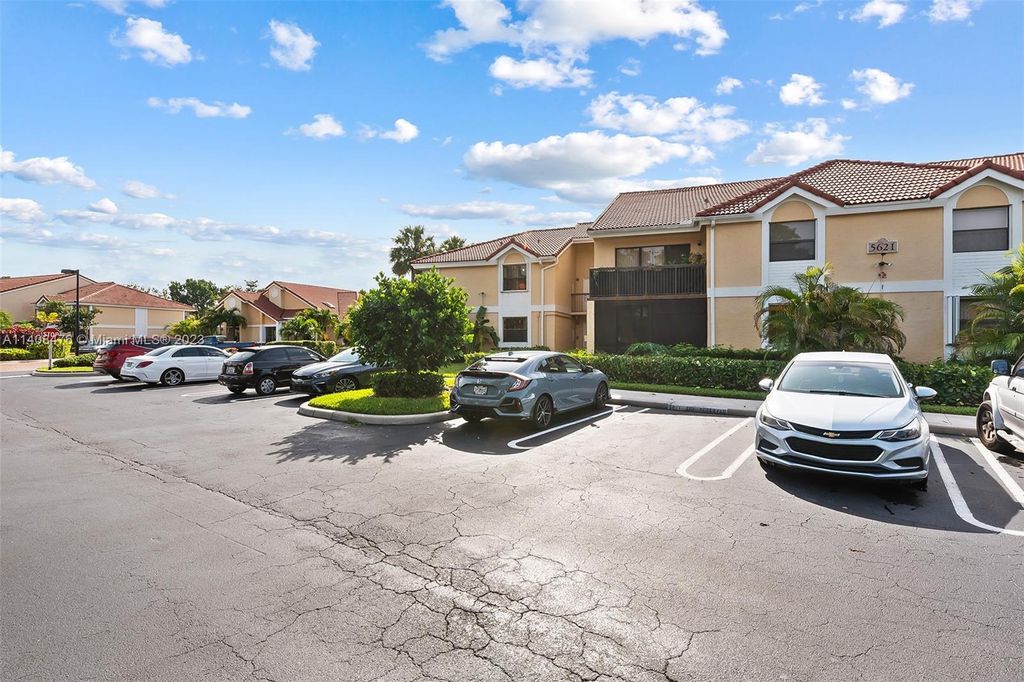 Photo of 5621 Riverside Dr #101A1, Coral Springs, FL 33067 (MLS # A11408476)
