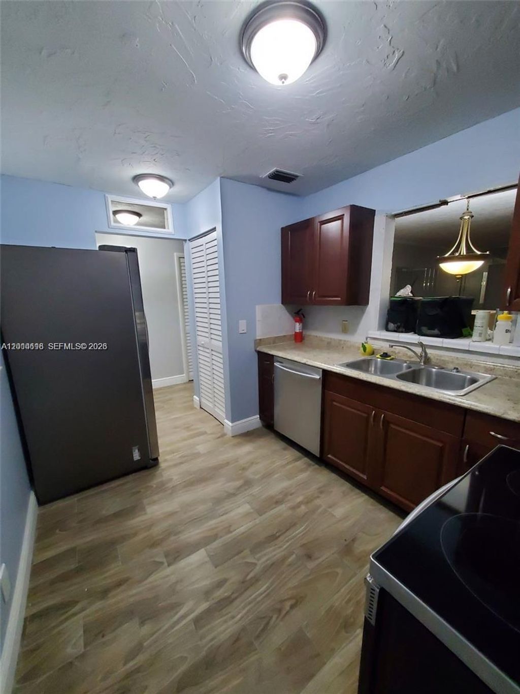 Photo of 8000 Lagos De Campo Blvd #A-303, Tamarac, FL 33321 (MLS # A12014618)