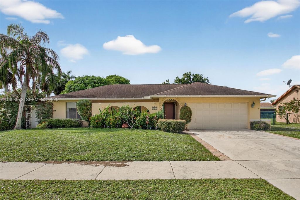 Photo of 701 NW 41st Ter, Deerfield Beach, FL 33442 (MLS # A11998972)