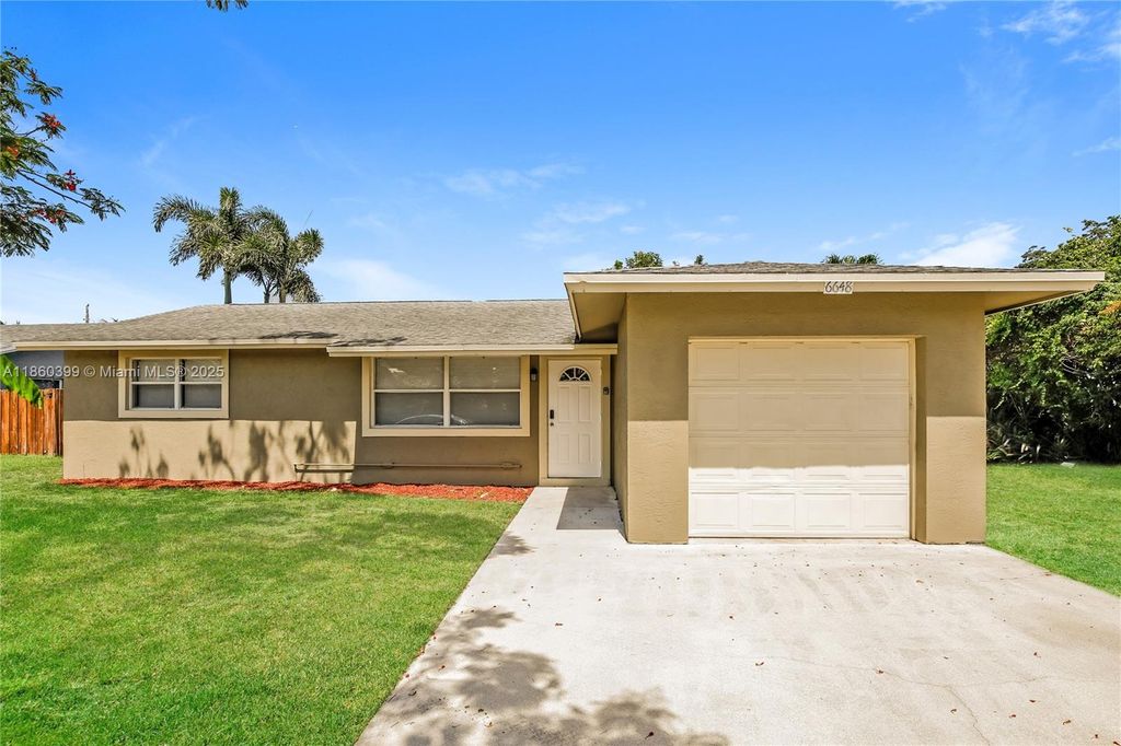 Photo of 6648 Osborne Dr, Lake Worth, FL 33462 (MLS # A11860399)