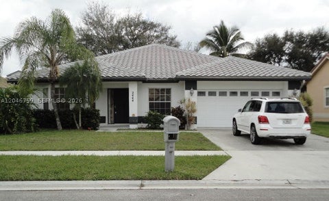 Photo of 2444 Stonegate Dr, Wellington, FL 33414 (MLS # A12046759)