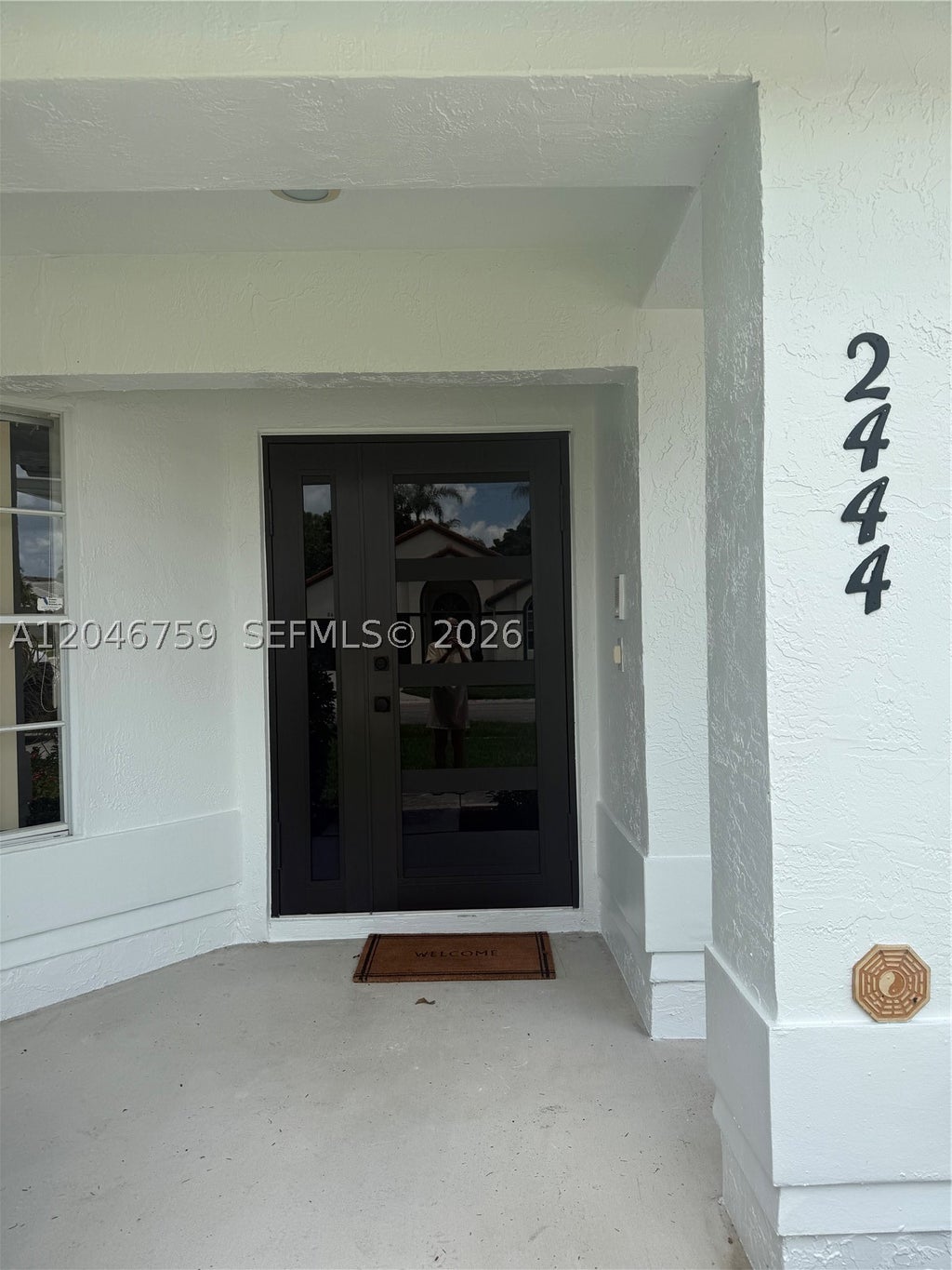 Photo of 2444 Stonegate Dr, Wellington, FL 33414 (MLS # A12046759)