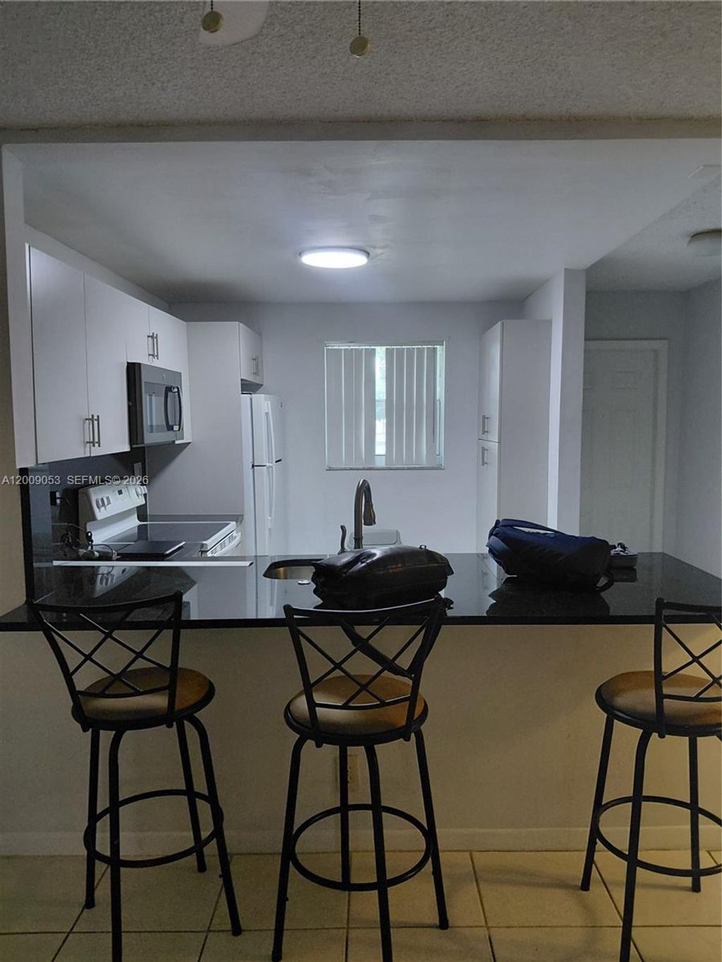 Photo of 1700 NW 58th Ter #1C, Sunrise, FL 33313 (MLS # A12009053)