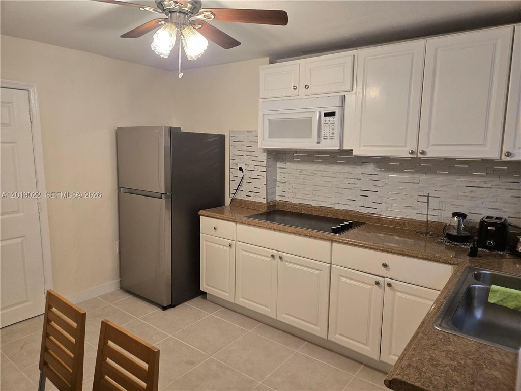 Photo of 5712 Hollywood Blvd #1, Hollywood, FL 33021 (MLS # A12019022)