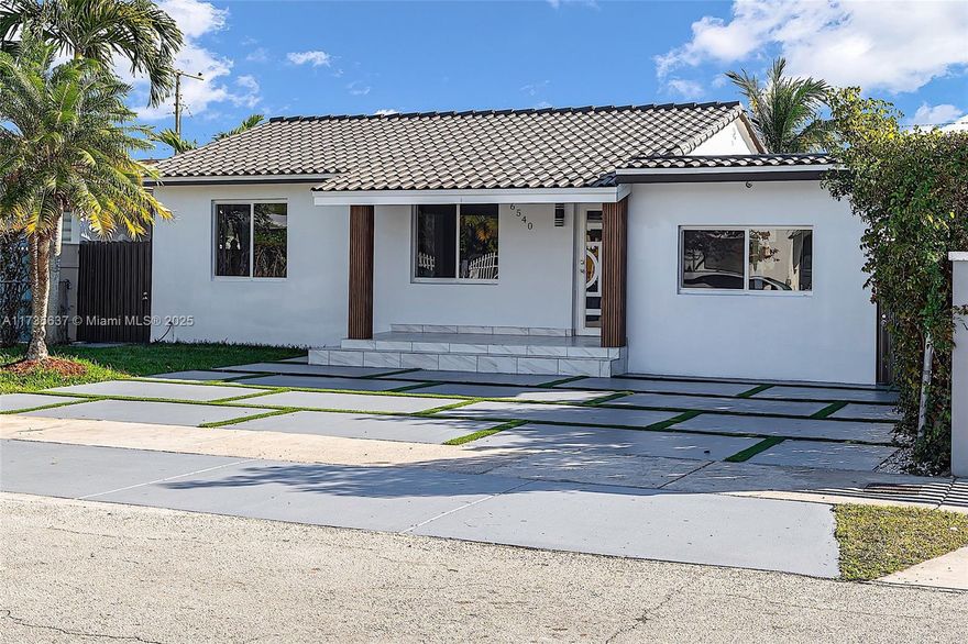 This stunning 4-bedroom, 3.5-bathroom home has been completely renovated with impact windows, doors, and modern finishes throughout. The open layout features a den/office, a versatile bonus room, and a gourmet kitchen with high-end appliances and quartz countertops. Every detail has been upgraded for style and comfort. Move-in ready and located in a prime neighborhood, this home offers luxury, security, and space for any lifestyle. Don’t miss out on this incredible opportunity!
