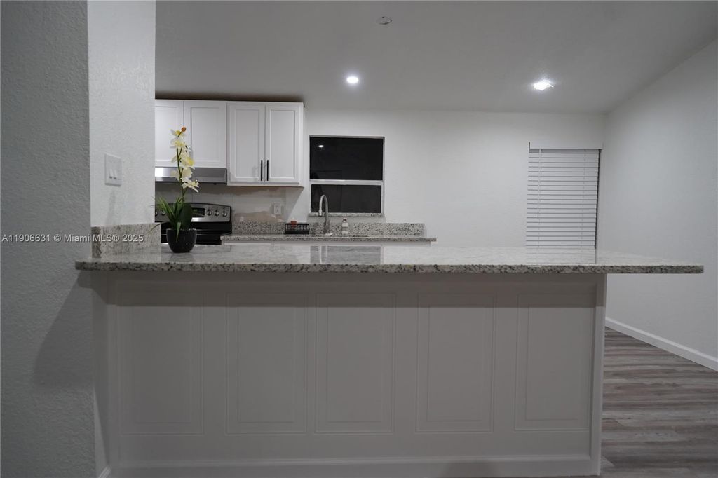 Photo of 9801 Oaks St, Tampa, FL 33635 (MLS # A11906631)