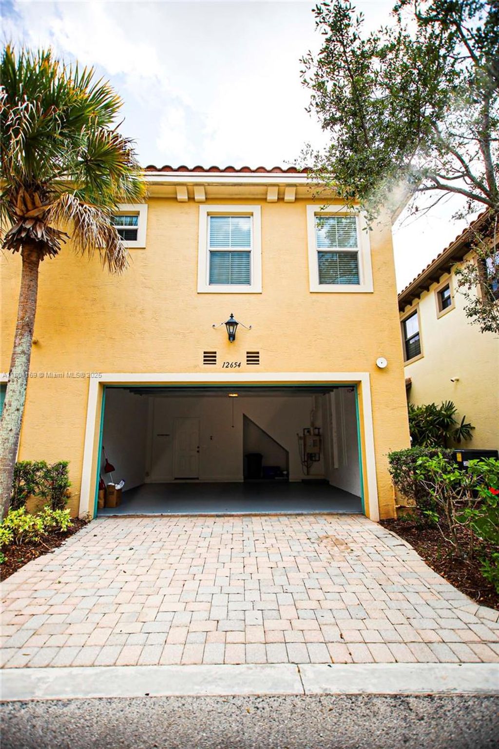 Photo of 12654 NW 32nd Pl, Sunrise, FL 33323 (MLS # A11804169)