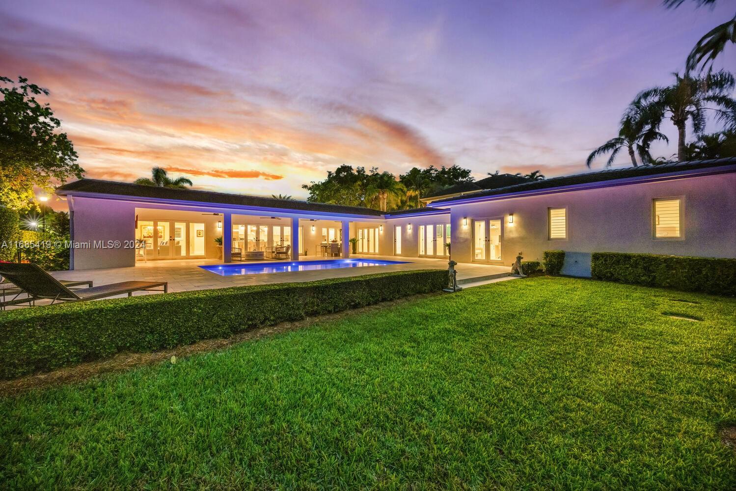 They say perfection doesn’t exist? They were wrong. This home redefines it - exquisitely finished, meticulously maintained, and beautifully & fully updated, overlooking the Riviera Country Club golf course! Do we even have to tell you all the perfect features? Stunning kitchen ideal for entertaining overlooking the newly renovated pool, summer kitchen and patio, spectacular bathrooms, new a/c’s, impact windows/doors, updated plumbing/electric, new flooring, lighting & landscape lights, 2-car gar. A den can easily be a 4th BR complete with Murphy bed, PLUS there’s a wonderful office “niche.” All new closets and the primary suite is a dream come true. Enjoy peace and serenity in the heart of Coral Gables at your new perfect golf home, just bring your toothbrush!