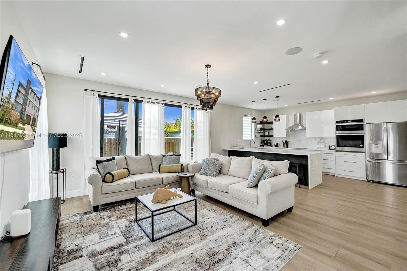 Available for Short or Long term, "Furnished" or "Unfurnished". Be the first to experience Luxury living in this brand new modern 4BDs & 4.5BA townhome, located minutes from Las Olas Blvd & the Beach. This never-lived- in immaculate Smart Home offers the epitome of contemporary elegance. Thoughtfully designed 3 levels layout with living room flowing into the dining area on the First level, 3 Bedrooms on the Second level including Primary Bedroom with private Balcony. Washer & Dryer is on the Second floor, ensuring effortless living. Oversized terrace on the 3rd level. Sleek, modern appliances and finishes. Ample closet space throughout. Large 2 car Garage with a private driveway. Spacious & fenced in front yard for outdoor enjoyment. The largest townhouse in the area! VIRTUALLY STAGED.