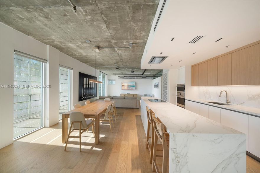 THE LARGEST & MOST DISTINCTIVE RESIDENCE AT THE MONTCLAIR LOFTS IN THE HEART OF SOUTH BEACH… A RARE DEVELOPER-COMBINATION UNIT & ONLY ONE OF ITS KIND! This Luxurious Loft has been completely and meticulously renovated from top to bottom. 2,076 SF of Interior Living Area currently configured as a Spacious 2 Bedroom (convertible to 3 Bedrooms) + 2.5 Bathrooms. This Exceptional home showcases a grand-scale Entertaining Room and seamless Open Kitchen concept, ideal for both everyday living and hosting. Brand New Mia Cucina Custom Kitchen and closets featuring premium Wolf & Sub-Zero Appliances, elegant Cosentino Stone countertops. Concrete Loft Ceilings with upgraded lighting. Refined European Storia Oak Wood flooring throughout. Exceptional natural light, clean architectural lines & timeless finishes. The Only Residence in the building with a dedicated Private Storage Unit. Quiet, well-maintained, and Boutique-Style Building ideally located just one block from iconic Lincoln Road, offering Unmatched Walkability to World-class Dining, Shopping, Entertainment, and the Best of Miami Beach Living.