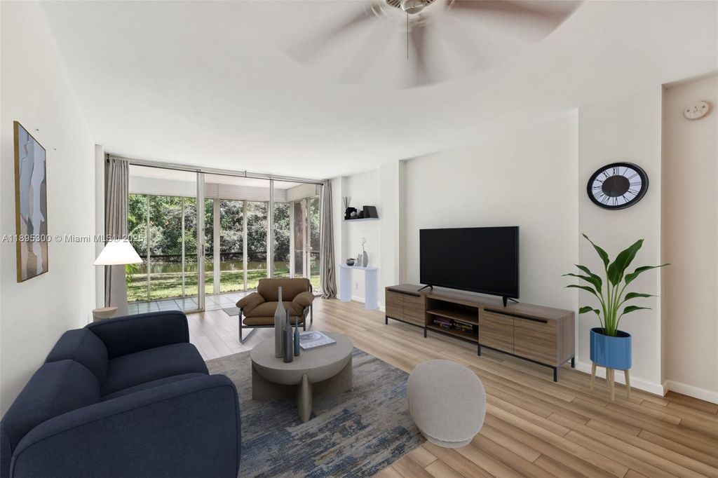 Photo of 101 Royal Park Dr #1D, Oakland Park, FL 33309 (MLS # A11895300)