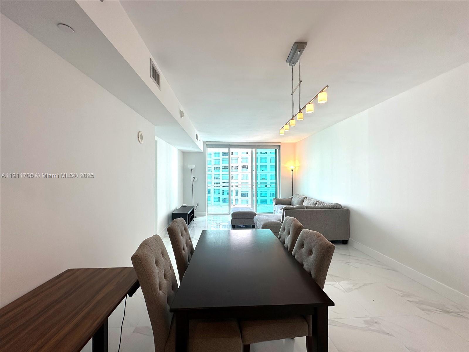 THE PLAZA 901 BRICKELL CO - Residential Lease