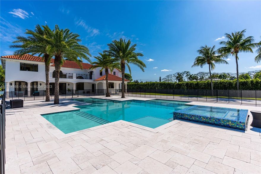 Experience luxury living in this magnificent Miller Estates home. This stunning 5 bedroom 4 bathroom property is situated on just over an acre lot with over 6000 total sf. Recently remodeled with the finest finishes throughout. Spacious living areas, formal dining room, two bonus rooms downstairs perfect for an office and/or a media room. Kitchen features Sub Zero and Wolf appliances. Expansive primary suite offers a walk in closet and a spa like bathroom with a soaking tub, and large shower. Home features impact windows and doors throughout. The resort style backyard is a tropical oasis, with an incredibly designed new heated pool and spa, and a large terrace perfect for entertaining. Located minutes from major expressways,restaurants,highly rated schools and much more.