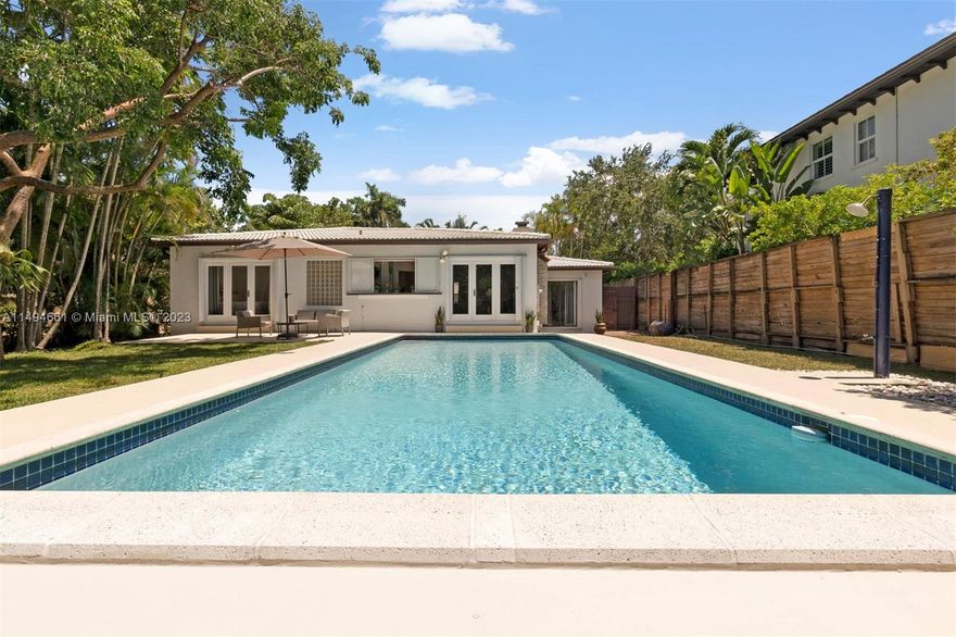 Location, Location, Location!!! Introducing a fabulous 3-bedroom, 2-bathroom bungalow home nestled in the heart of Coconut Grove. Situated on an oversized 9,100 SF lot with stunning landscaping, large pool and the added benefit of direct private access to Merrie Christmas Park. The open and sun-filled spaces creates a welcoming atmosphere, with updated kitchen, granite countertops and stainless steel appliances. Enjoy the serenity of this incredible location in the heart of South Coconut Grove & minutes to CocoWalk. Close to best rated schools, shopping areas, restaurants, marinas and parks. Easy access to highway, Downtown Miami, Brickell and airport. Don't miss the chance to own this charming Coconut Grove home with direct park access. 1611 Actual SF. Schedule a showing today!