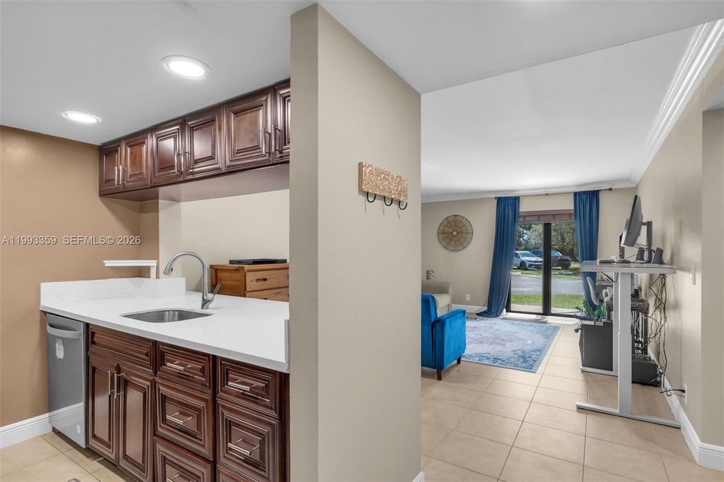 Photo of 10001 W Atlantic Blvd #118, Coral Springs, FL 33071 (MLS # A11993359)