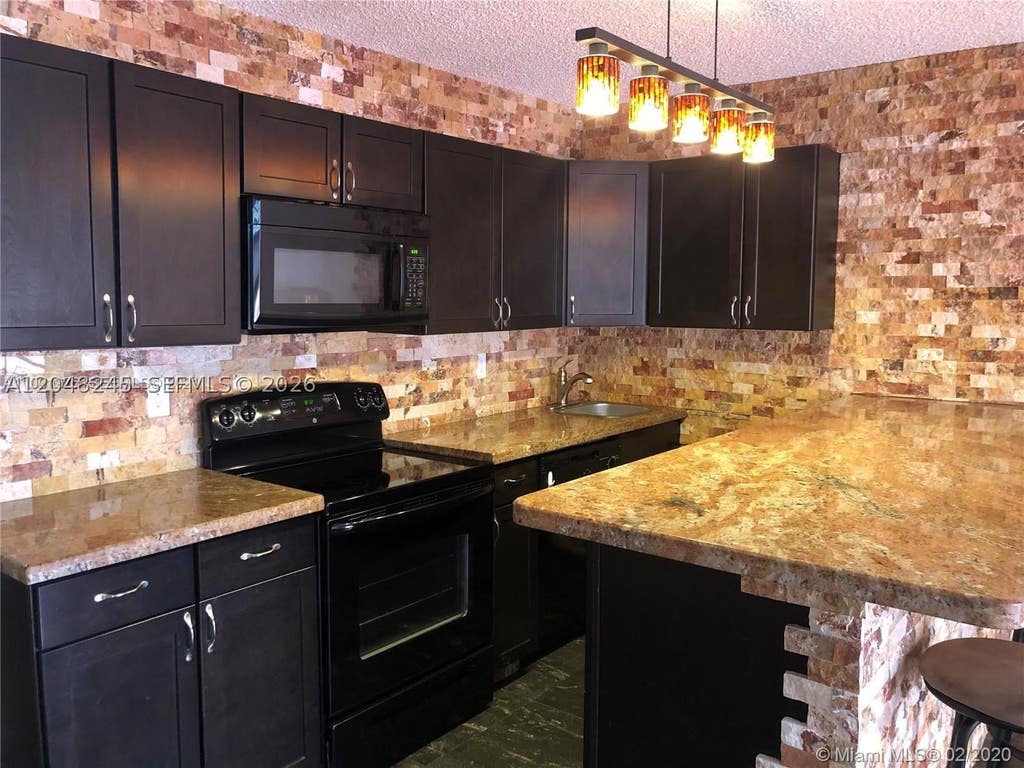 Photo of 600 SE Three Islands Blvd #1018, Hallandale Beach, FL 33009 (MLS # A12048245)