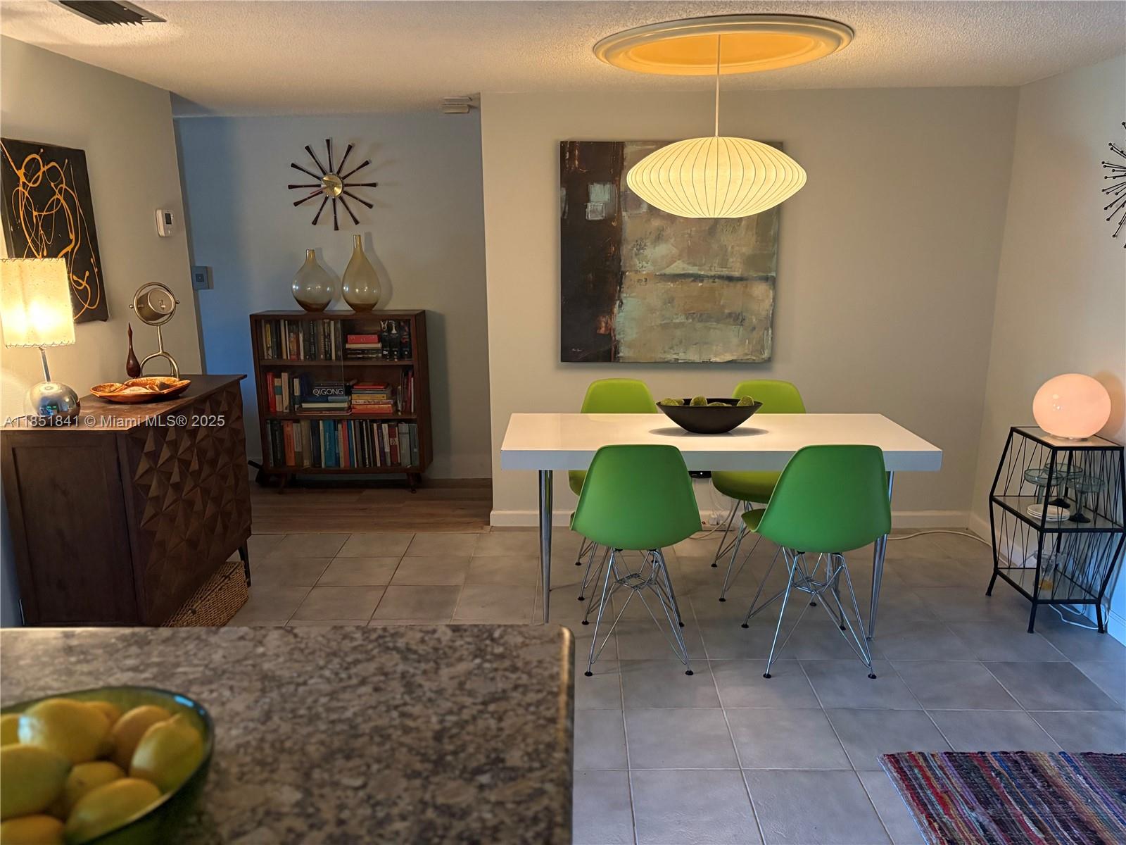 Stunning Waterfront Ground-Floor Condo. Live the Wilton Manors lifestyle at a great price! Save on parking with a short stroll to all the bars, restaurants and street cafes. Minutes from Fort Lauderdale beaches. This gem features high-end appliances, granite countertops, reverse osmosis water filtration system, soaking tub in primary suite, impact glass and electric hurricane shutters for peace of mind. Assigned parking right outside your private patio entrance. Enjoy serene surroundings with lush gardens, a heated pool, clubhouse, BBQ area. It's tranquil setting feels like a hidden retreat. HOA includes WiFi, Water, trash, pest control and more. Full reserves, no assessments, all inspections completed. Furniture negotiable. Rare find/extremely desirable area. Act fast this one won’t last!