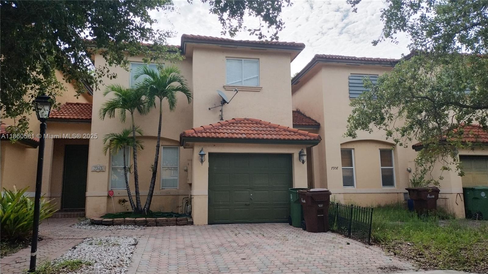 Location, location, location. Hialeah, across the street from the main road, has public transportation, a shopping center, a supermarket, etc. The two-story unit has a one-car garage. A fenced patio is included. All tile on through, balcony in the master bedroom, washer and dryer in the garage. NO ASSOCIATION APPROVAL. Excellent condition, top-of-the-line appliances; freshly painted, all bedrooms with brand new tiles. Easy to show call listing agent for an appointment.