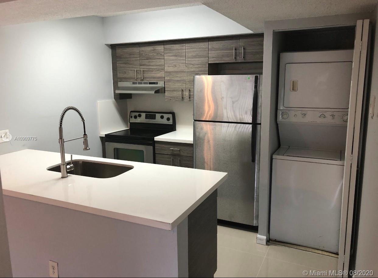 Immediate Move-in Available!! All Ages Welcome! No Association Approval Required!!! Quiet and safe living in a beautiful gated community in Tamarac. Unit features, brand new kitchen & bathroom, private in-unit laundry with in-unit washer and dryer, beautiful wood flooring throughout the entire apartment, Stainless Steel Appliances, New Paint, new central A/C, walk-in closet, screened balcony. Enjoy this beautiful gated community with amenities that include, Volley ball court, pool with hot tub, fitness center, Tennis Courts, elegant clubhouse lounge and much more.