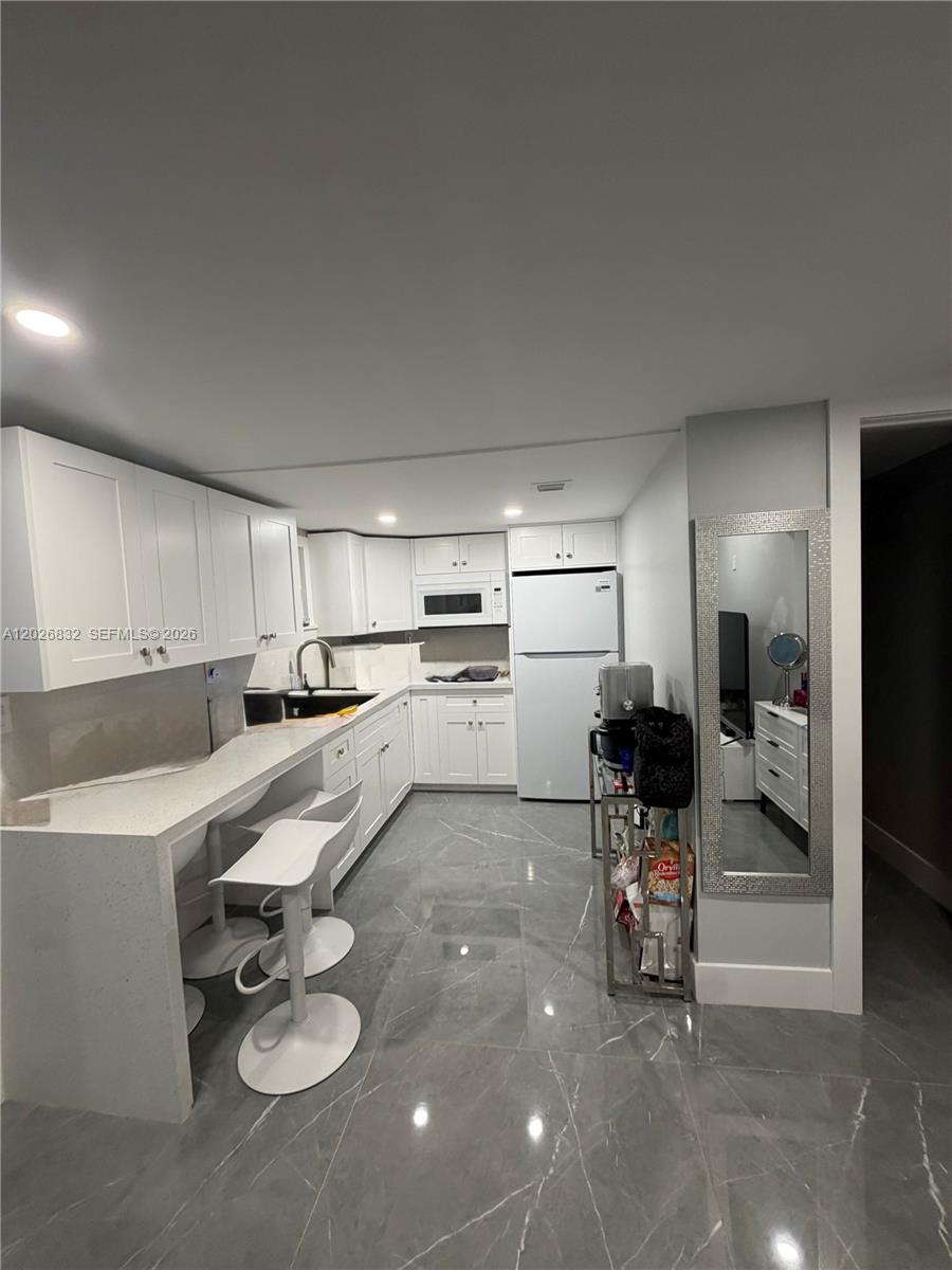 View photos, virtual tours, details... 1210 SW 91st Ave 1210