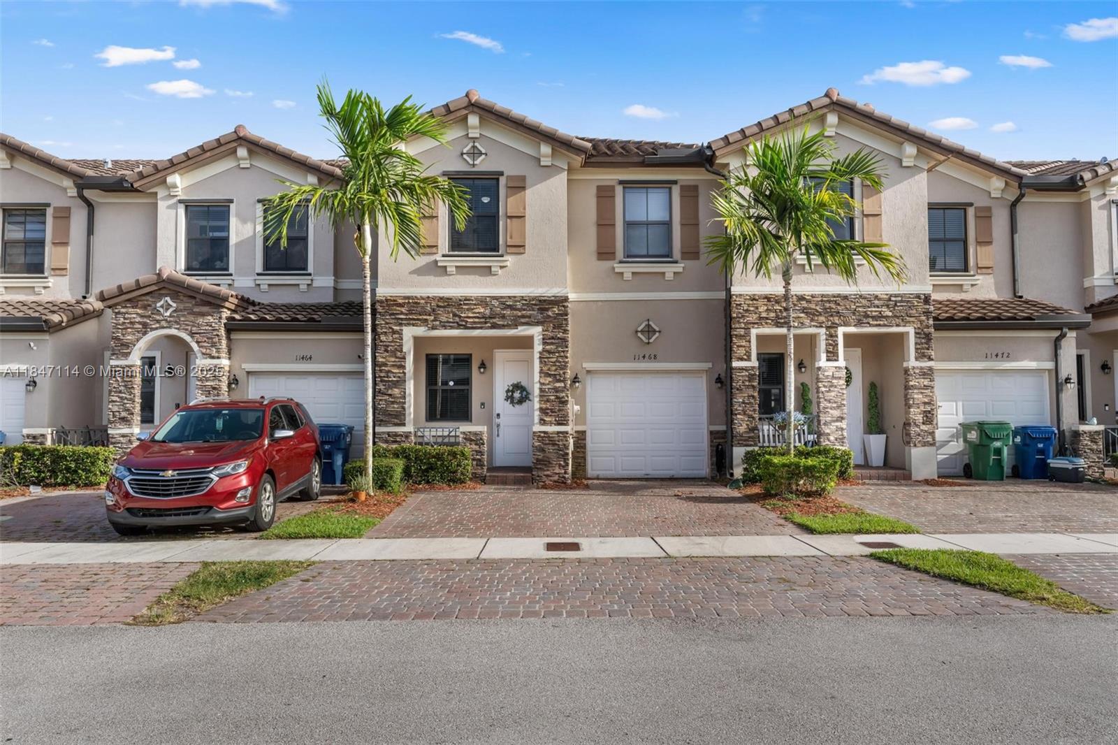 Modern Townhome in Sought-After Artesa Community. Beautiful 2 story 3 bedroom, 2.5 bathroom home featuriing a spacious open concept lay out. The kitchen boasts granite countertops, stainless steel appliances, rich espresso cabinetry, and a large breakfast counter that seamlessly connects to the dining and living areas. All bedrooms are located upstairs, including a spacious primary suite with tray ceilings, a walk-in closet, and a luxurious en-suite bath with dual sinks and a glass-enclosed shower. The home also includes a full laundry room and a private, paved backyard patio—perfect for outdoor grilling or relaxing. Enjoy community amenities including a clubhouse, pool, gym, playground, and 24/7 security. Located minutes from the Turnpike, top-rated schools, shopping, and dining.