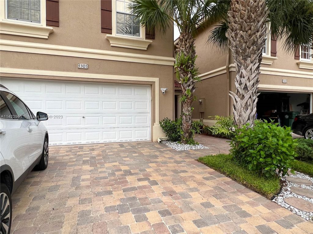 Photo of 4305 Bamboo Palm Ct, Green Acres, FL 33463 (MLS # A11422965)