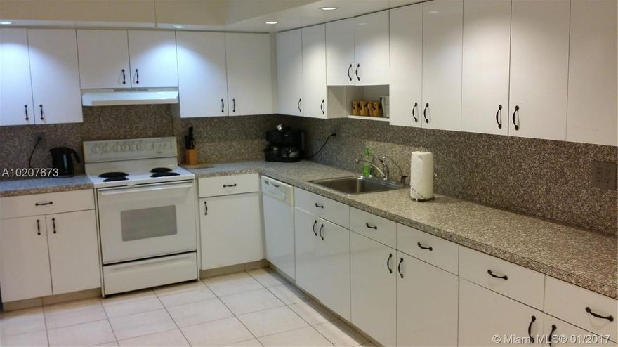 2 bed 2 bath PANORAMIC VIEWS OF THE LANDSCAPED GARDENS,TENNIS COURT & POOL AREA.THIS UNIT TOTALLY PAINTED HAS EXCEPTIONAL CLOSETS PLUS UPDATED FAMILY SIZE KITCHEN, NEWER A/C SYSTEM FOR EFFICIENCY & NEW BATHROOMS.WELL MAINTAINED THROUGHOUT.THE OLYMPUS IS A RESORT STYLE CONDO WHICH OFFERS TOP AMENITIES INCLUDING TENNIS, MARINA,FITNESS CENTER & TWO LARGE HEATED POOLS.PRIME LOCATION,MINUTES TO WHITE SANDY BEACHES, RESTAURANTS,CASINOS