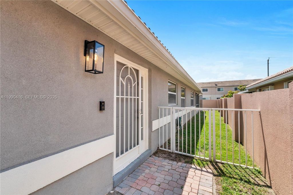 Photo of 5477 Grande Palm Cir, Delray Beach, FL 33484 (MLS # A11990416)