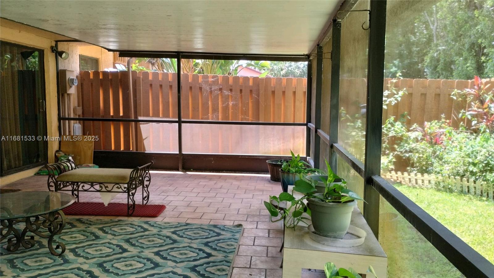 Fixer-upper alert! This home features an open floor plan with vaulted ceilings, creating a bright, airy living space. Enjoy a private screened-in patio, perfect for morning coffee or evening relaxation. Centrally located near shopping, dining, and entertainment, with the community pool just steps away. Inside, you'll find spacious bedrooms, a walk-in closet, and a dedicated laundry room. Plenty of guest parking, and cable is included in the HOA. New roof required, and the home is being sold "AS IS." Don’t miss out on this opportunity to embrace the vibrant 55+ community lifestyle. Schedule a tour today!