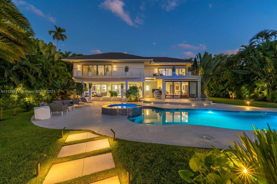 Treat yourself to the ultimate coastal lifestyle in this immaculate residence desirably set on a double waterfront lot in Surfside! Spanning across 6,954 sq ft, this gut renovated abode comes with 6-bedrooms, 6.5-baths on beautiful Biscayne Bay. Gleaming porcelain tile flooring cascades under the glow of recessed lighting across the main gathering areas. The kitchen features top-of-the-line appliances that’s sure to please the home chef. Pamper yourself in the expansive primary bedroom that highlights an office space & a deluxe 5-piece ensuite. Completing this unique gem’s impressive list of features is an expansive backyard that comes with a shimmering pool & spa. As a bonus, you’ll have an attached 2-car garage & extended drive to accommodate plenty of parking. Come for a tour today!